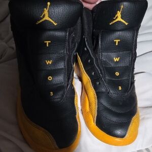 Nike Air Jordan 12 Retro in the Black and University Gold. 1Y. Need Laces